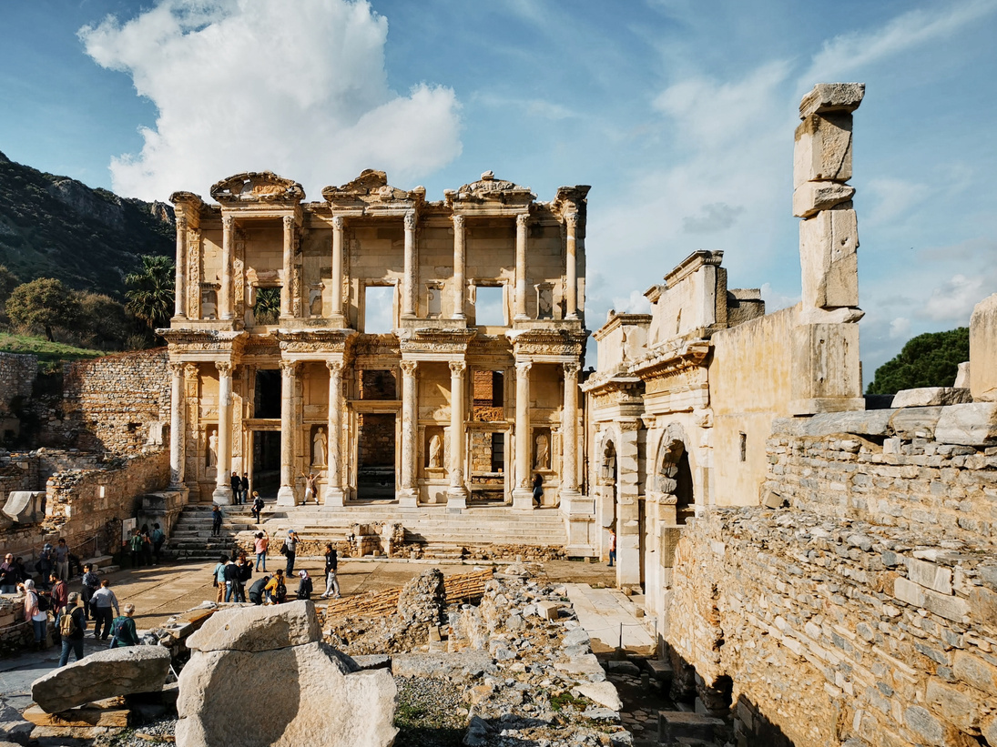 People Sightseeing Roman Ruins
